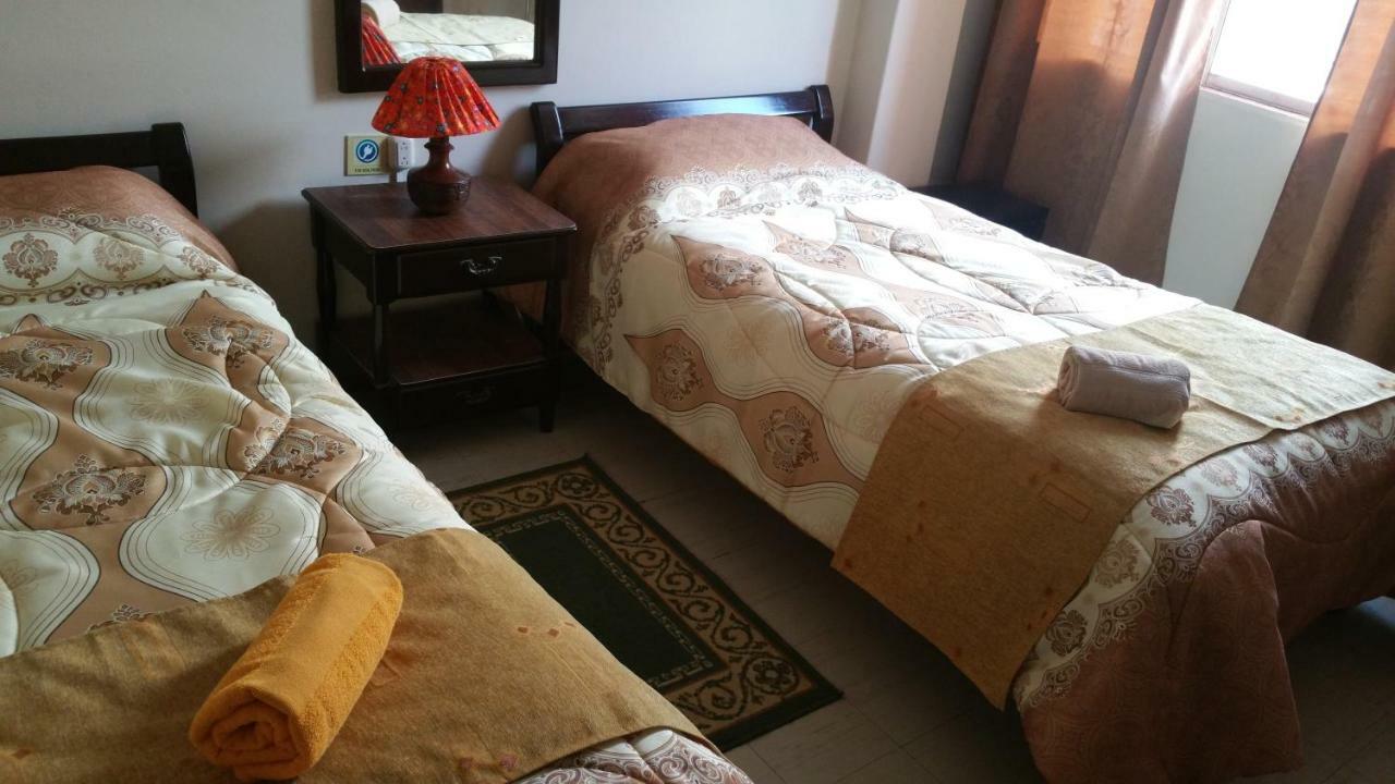 Hotel Flor De Oriente بانيوس المظهر الخارجي الصورة